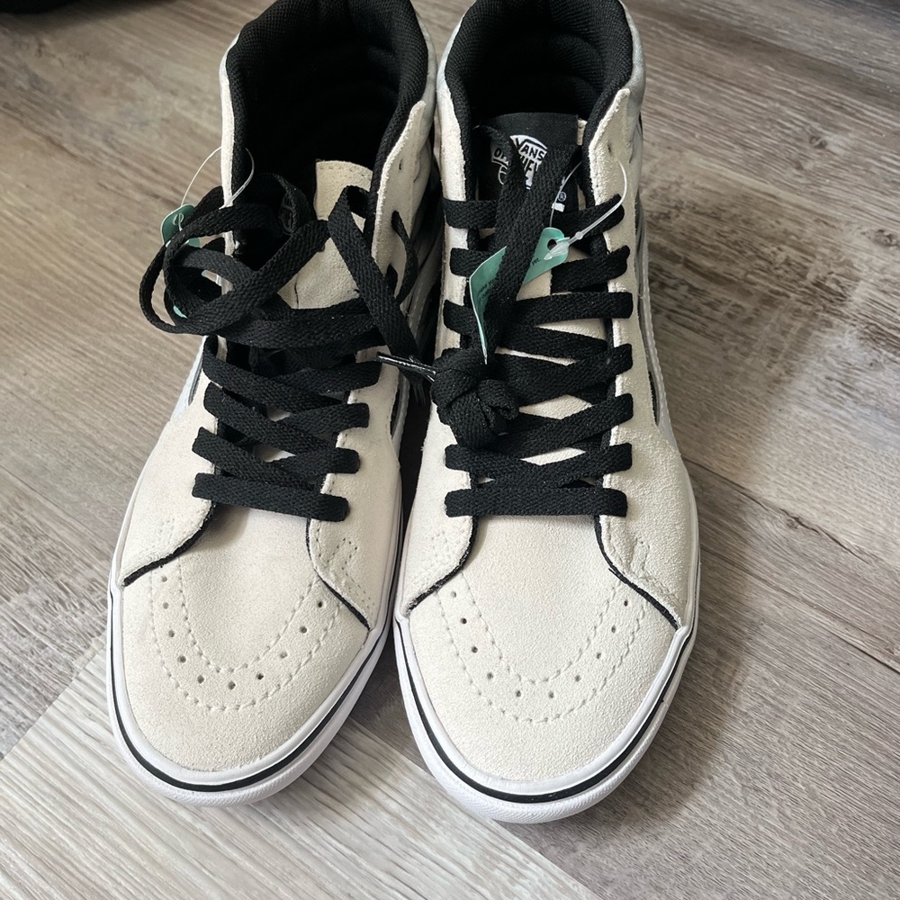 Black and white suede vans size 6 women’s size 7.5.  New with tags and box